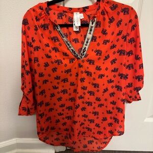 Orange/red blouse with navy elephant print